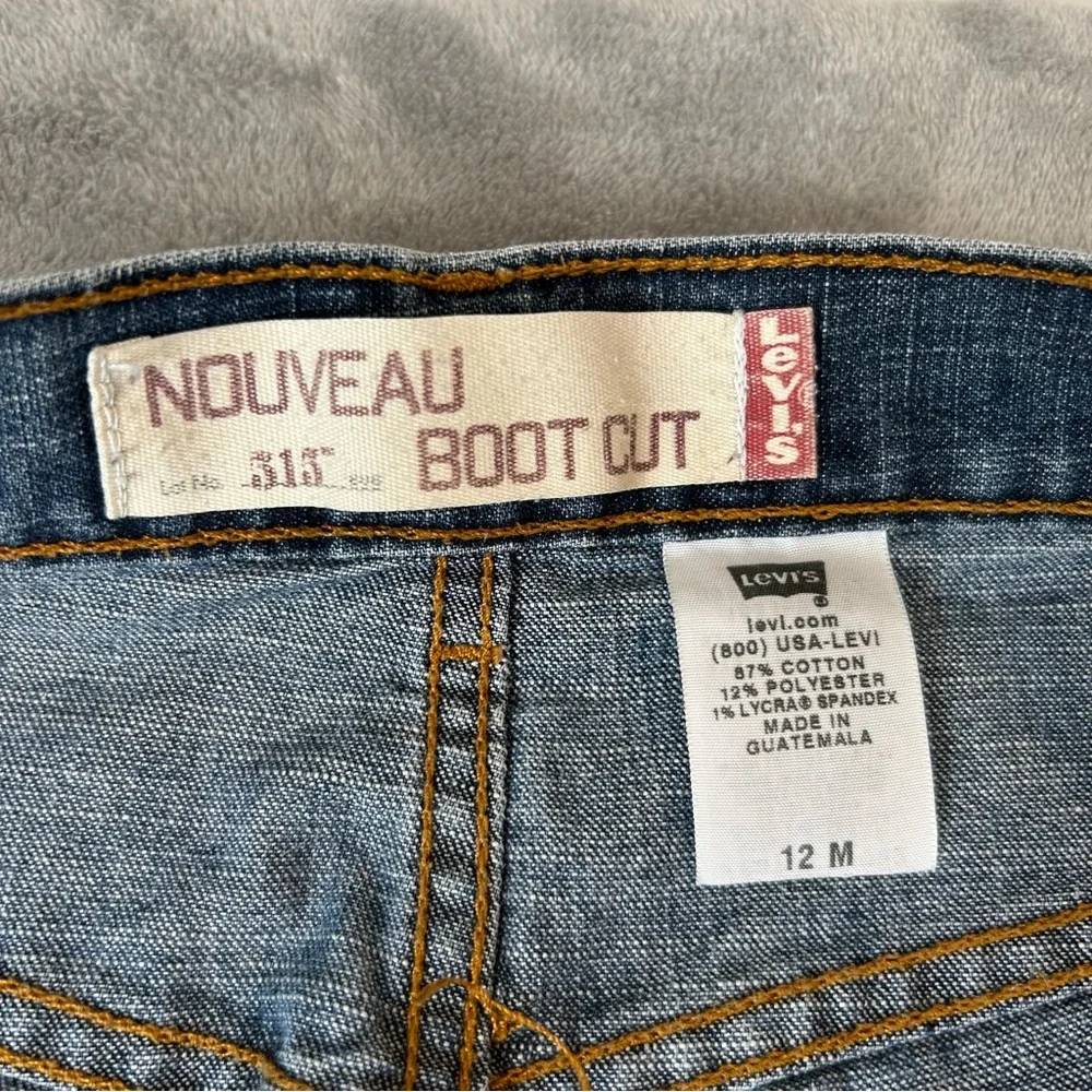 Vintage Levi's 515 Nouveau Boot Cut Jeans Women's‎ Sz 12 M Blue Med Wash Denim